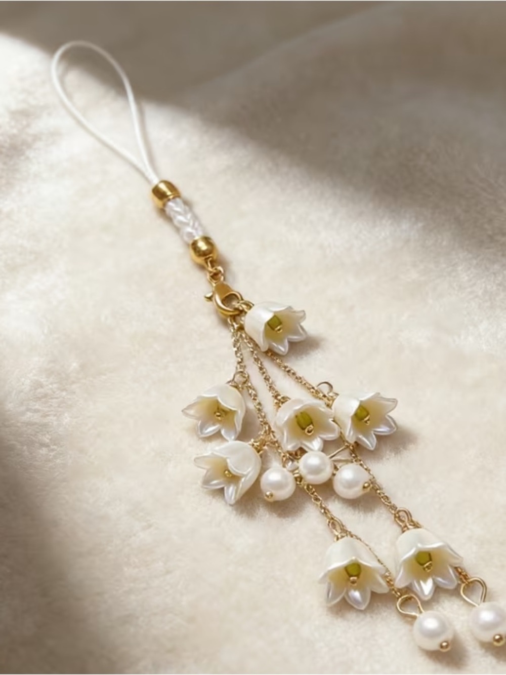 Delicate White Floral Charm with Pearls - Gold Accents
